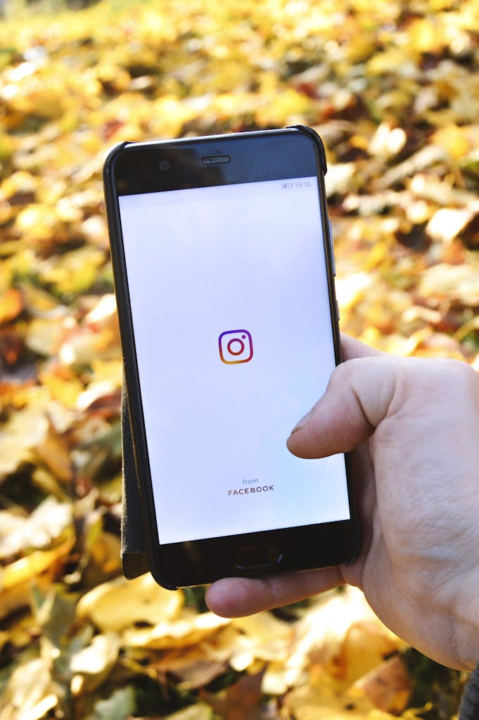 A Person Holding Black Smartphone